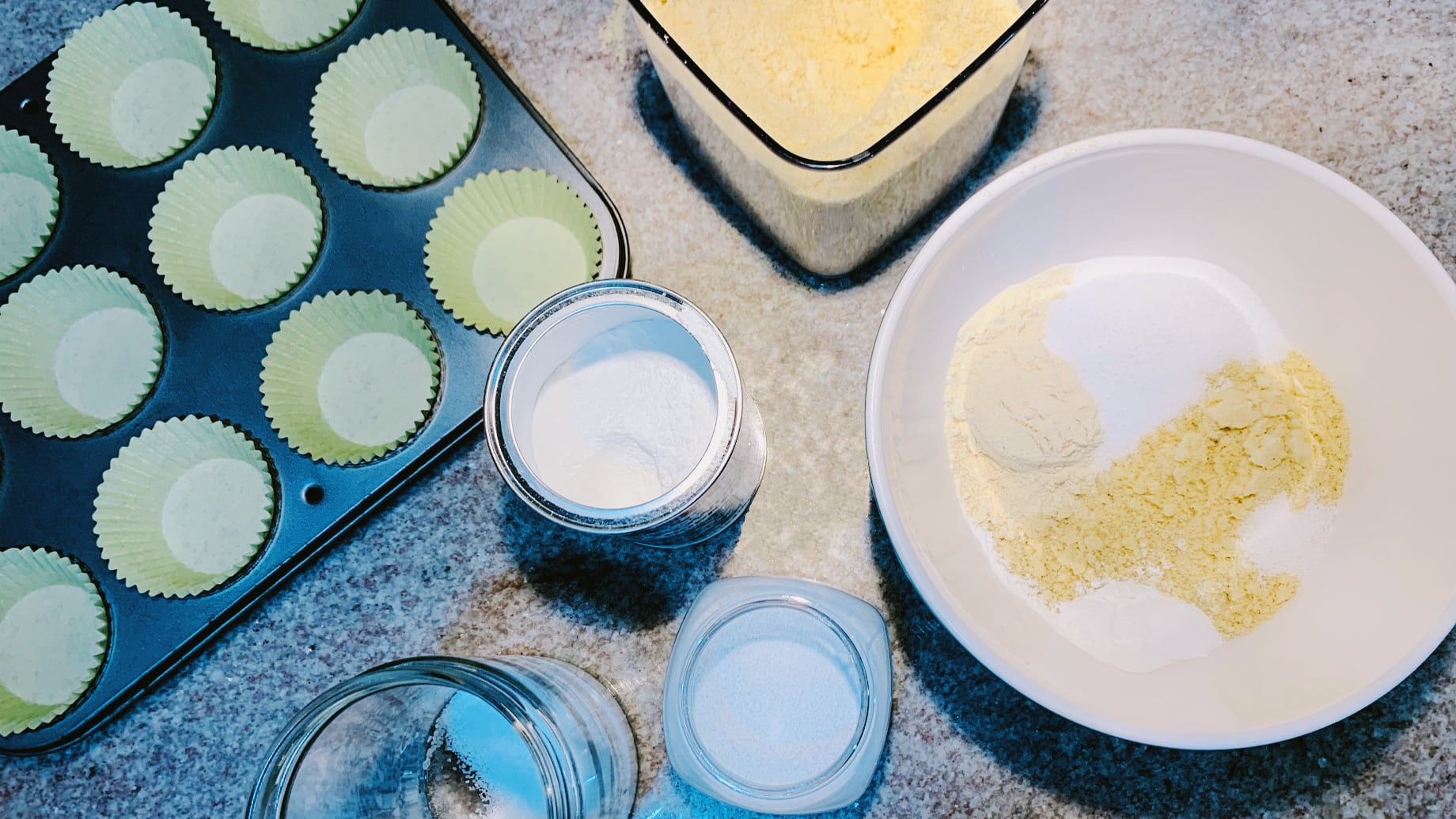 Almond Flour, Coconut Flour, Baking Powder, Salt and Sweetener in a Bowl